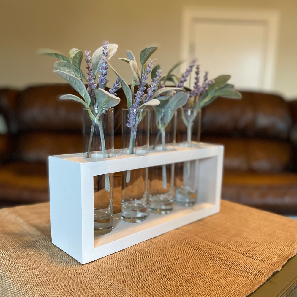 Home decor - wood stand, glass vases, floral/greenery